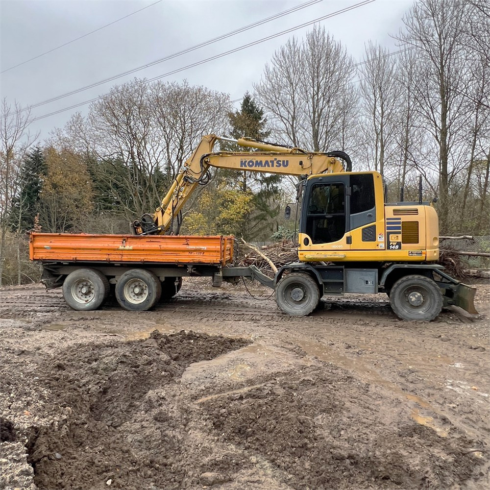 Komatsu PW148-10 - Gumikerekes kotró: 5 kép. Komatsu PW148-10 - Gumikerekes kotró: 5 kép.