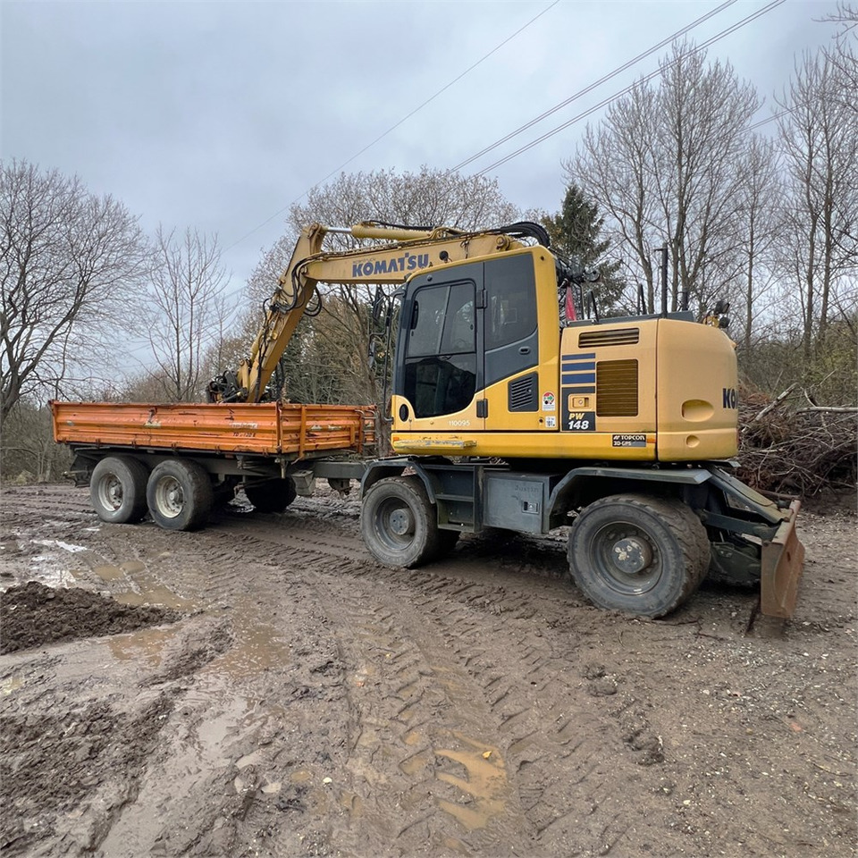 Komatsu PW148-10 - Gumikerekes kotró: 4 kép. Komatsu PW148-10 - Gumikerekes kotró: 4 kép.