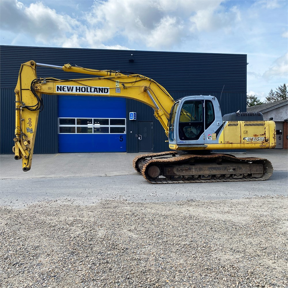 New Holland E 265 B - Lánctalpas kotró: 1 kép. New Holland E 265 B - Lánctalpas kotró: 1 kép.