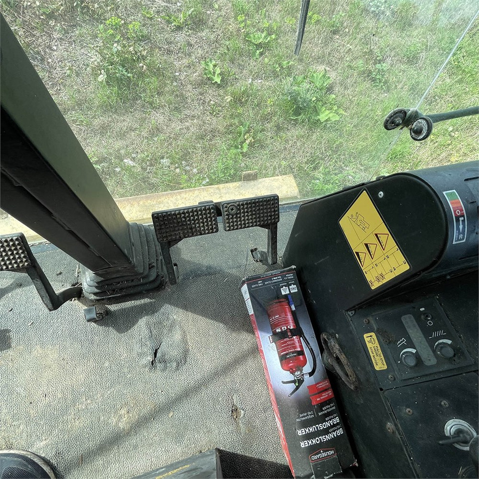Kombájn New Holland TX 30: 24 kép.