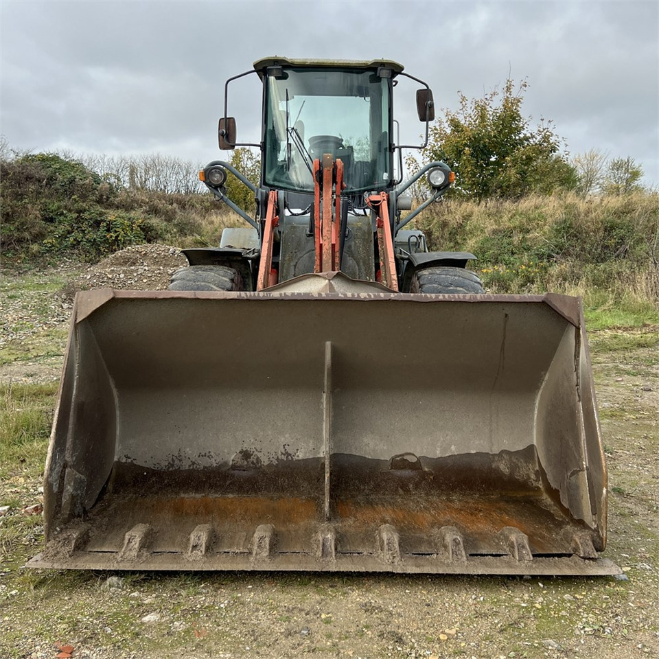 O&K L25.5 - Gumikerekes homlokrakodó: 4 kép. O&K L25.5 - Gumikerekes homlokrakodó: 4 kép.