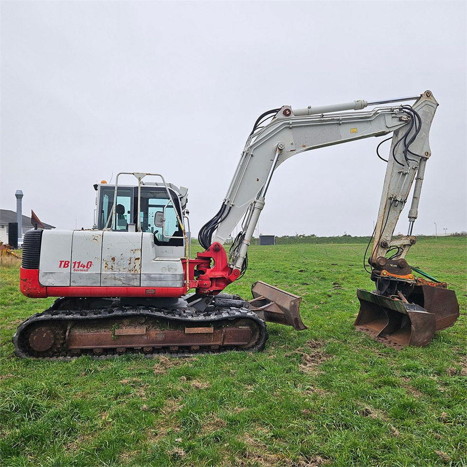 Lánctalpas kotró Takeuchi TB1140: 6 kép.