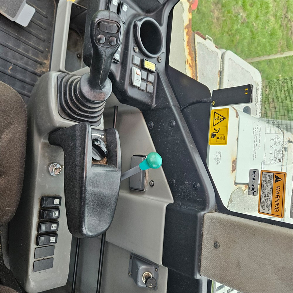 Lánctalpas kotró Takeuchi TB1140: 14 kép.