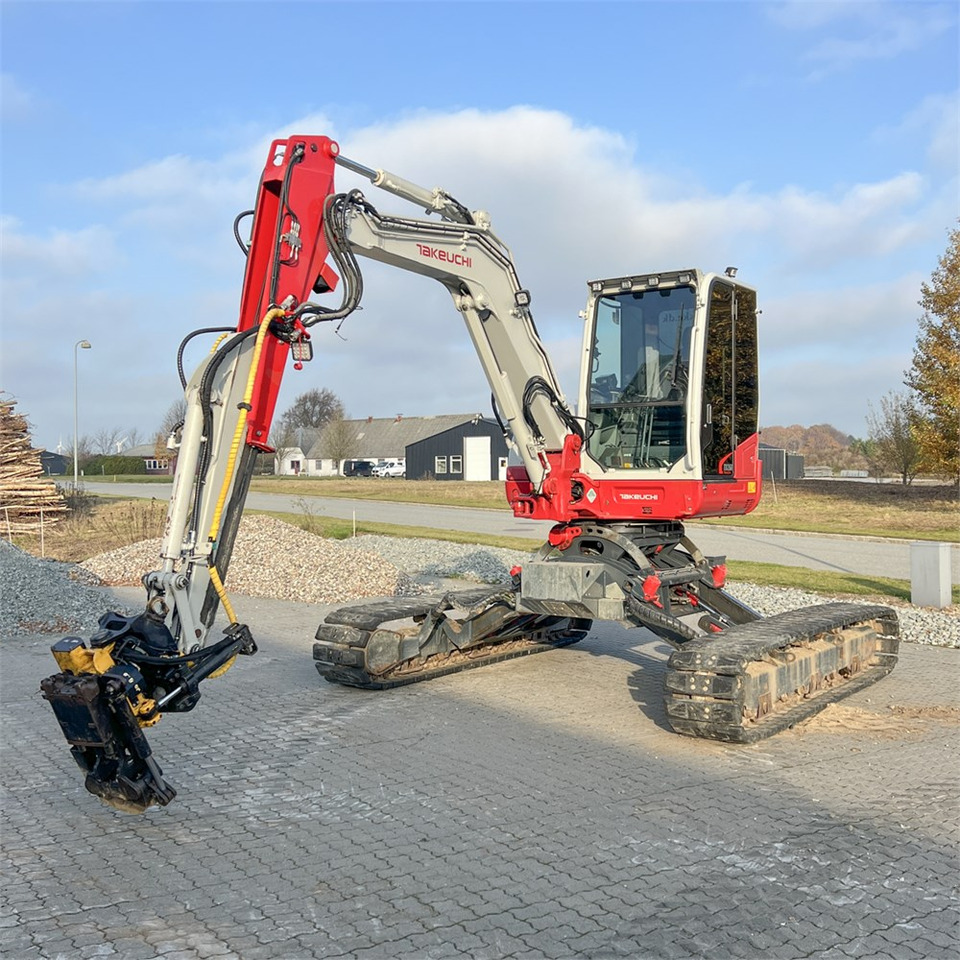 Takeuchi TB260 Levelizer - Minikotró: 1 kép. Takeuchi TB260 Levelizer - Minikotró: 1 kép.