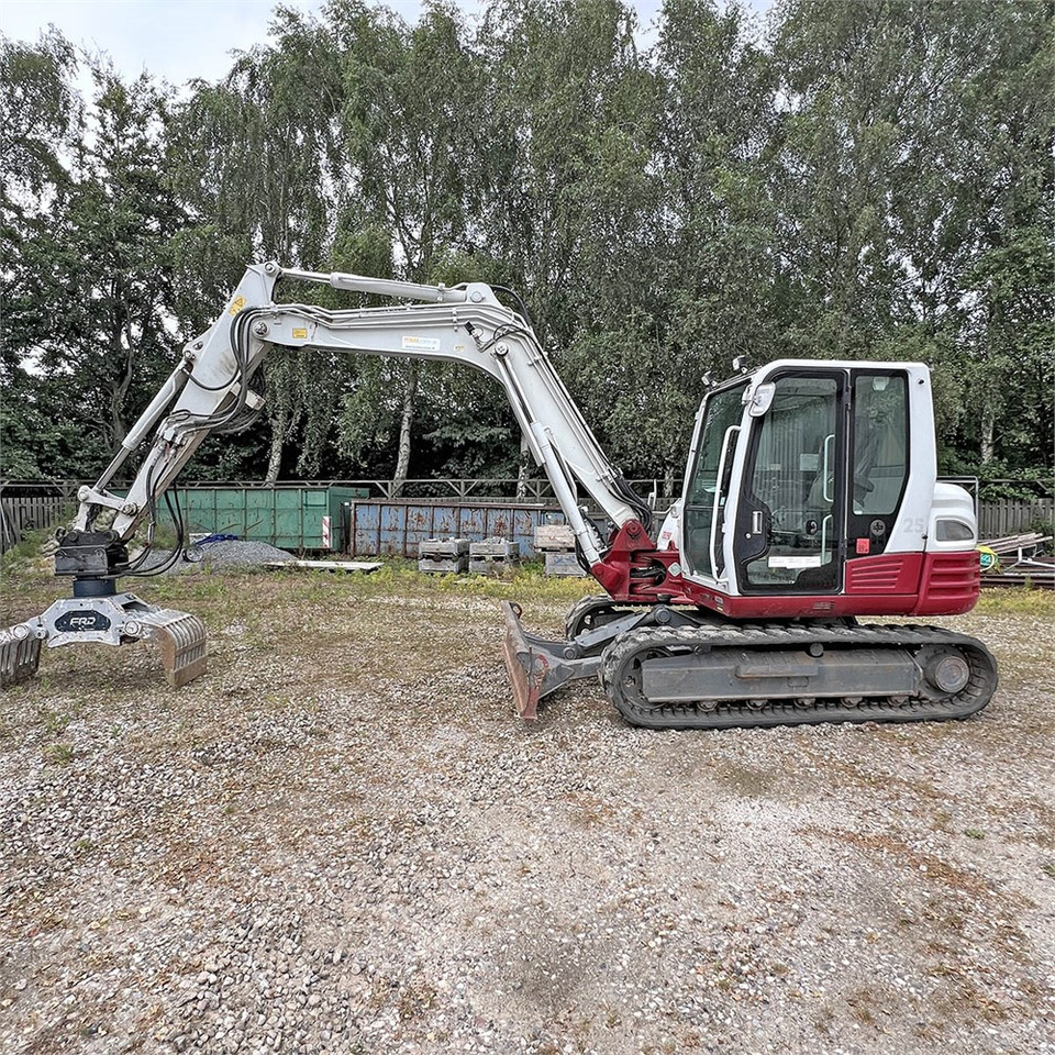 Takeuchi TB290 - Minikotró: 2 kép. Takeuchi TB290 - Minikotró: 2 kép.