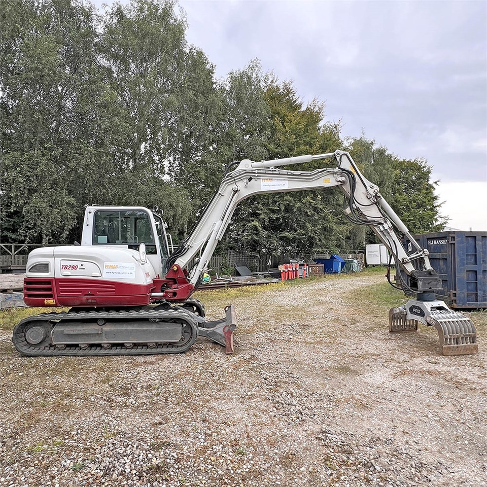 Takeuchi TB290 - Minikotró: 3 kép. Takeuchi TB290 - Minikotró: 3 kép.