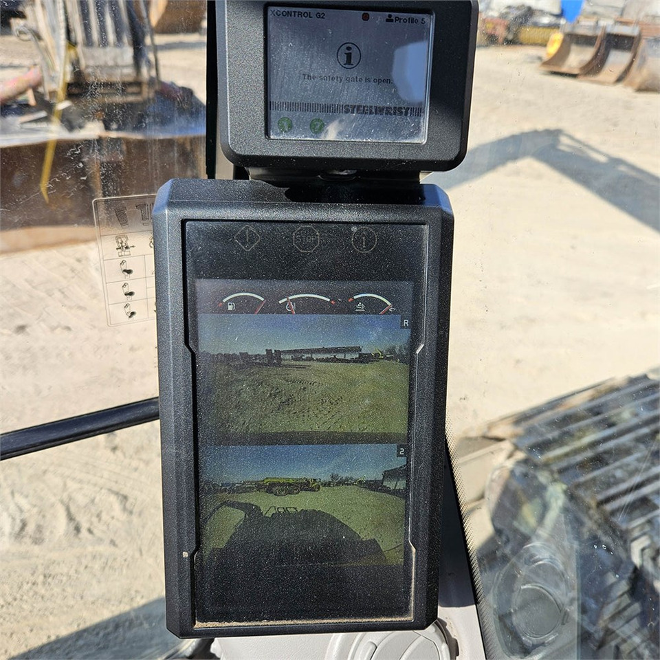 Lánctalpas kotró Volvo EC200 EL: 17 kép.