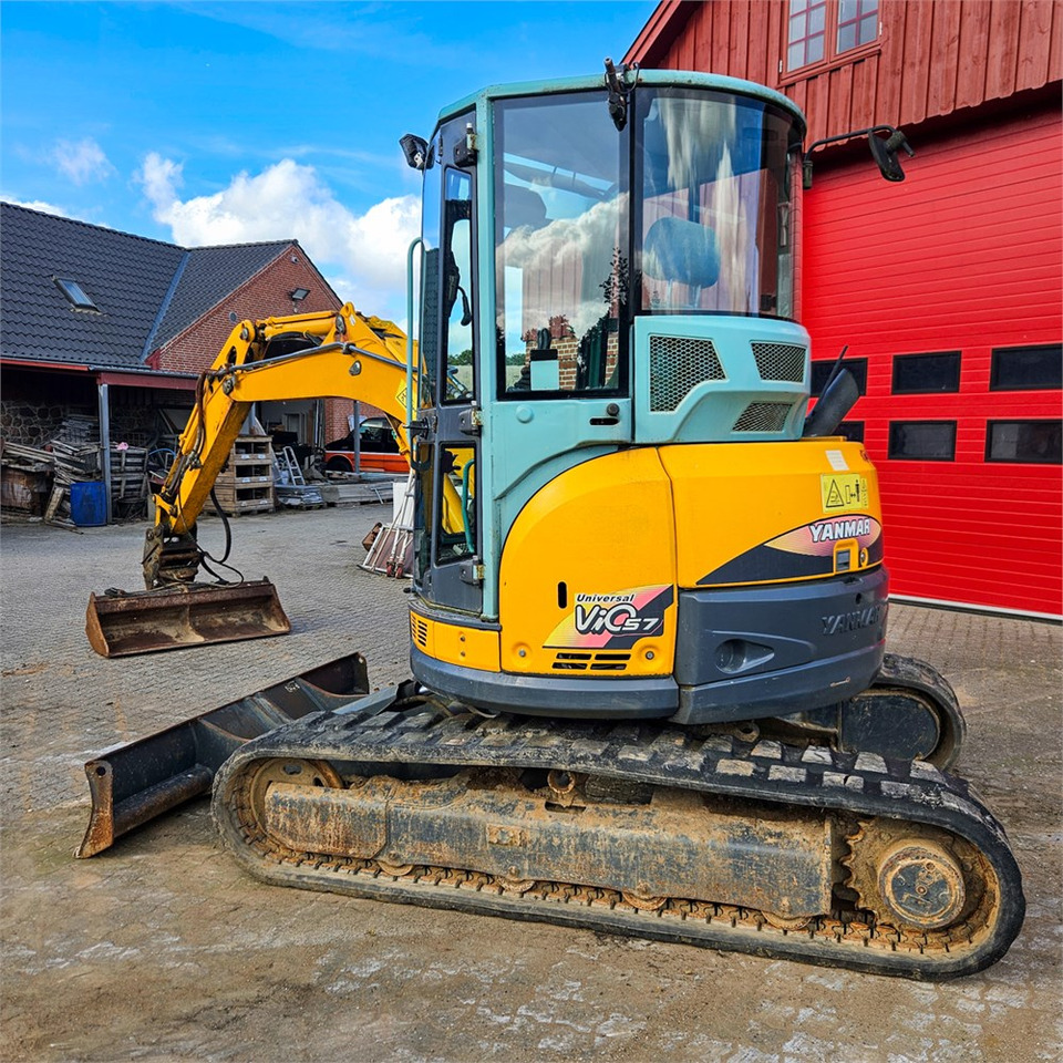 Yanmar VIO57-U - Minikotró: 3 kép. Yanmar VIO57-U - Minikotró: 3 kép.