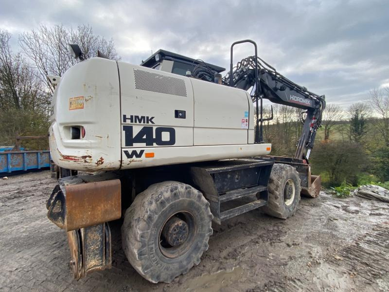 Hidromek HMK 140W-3B - Gumikerekes kotró: 3 kép. Hidromek HMK 140W-3B - Gumikerekes kotró: 3 kép.