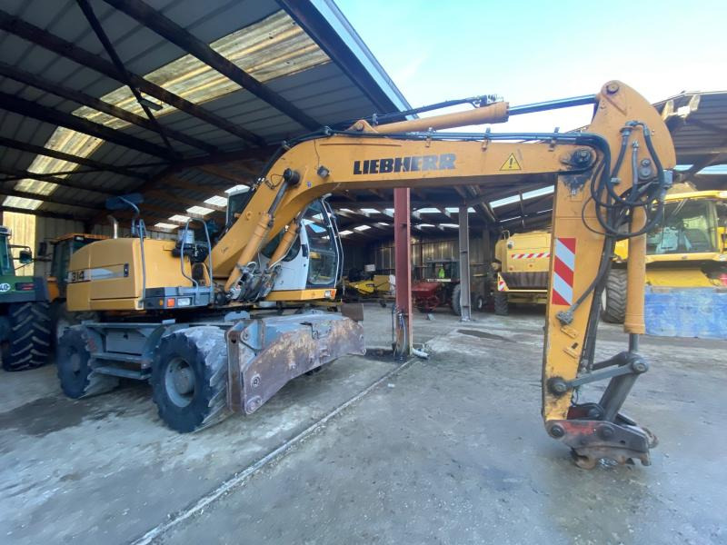 Liebherr A314 Litronic - Gumikerekes kotró: 1 kép. Liebherr A314 Litronic - Gumikerekes kotró: 1 kép.