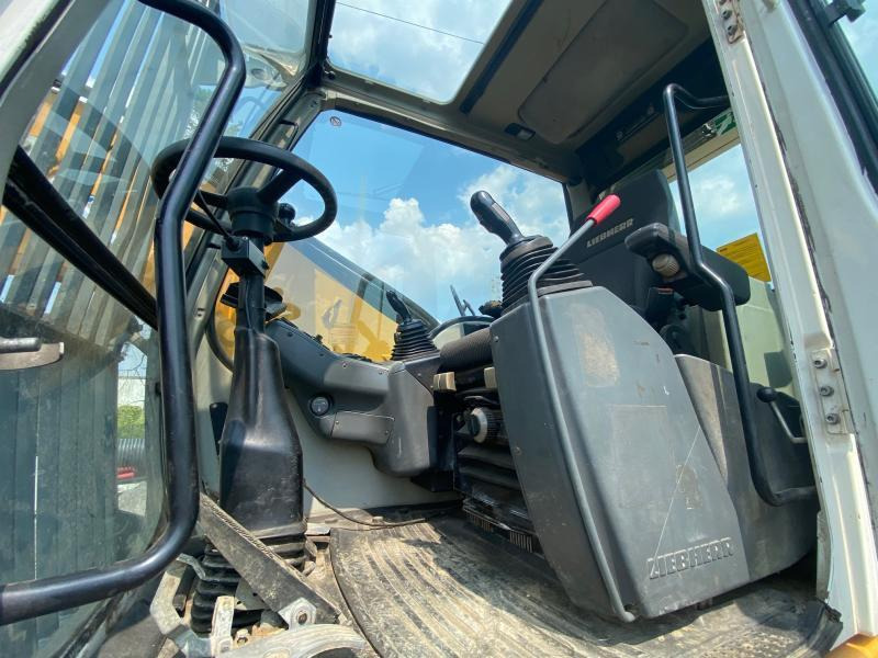 Gumikerekes kotró Liebherr A316Litronic: 14 kép.