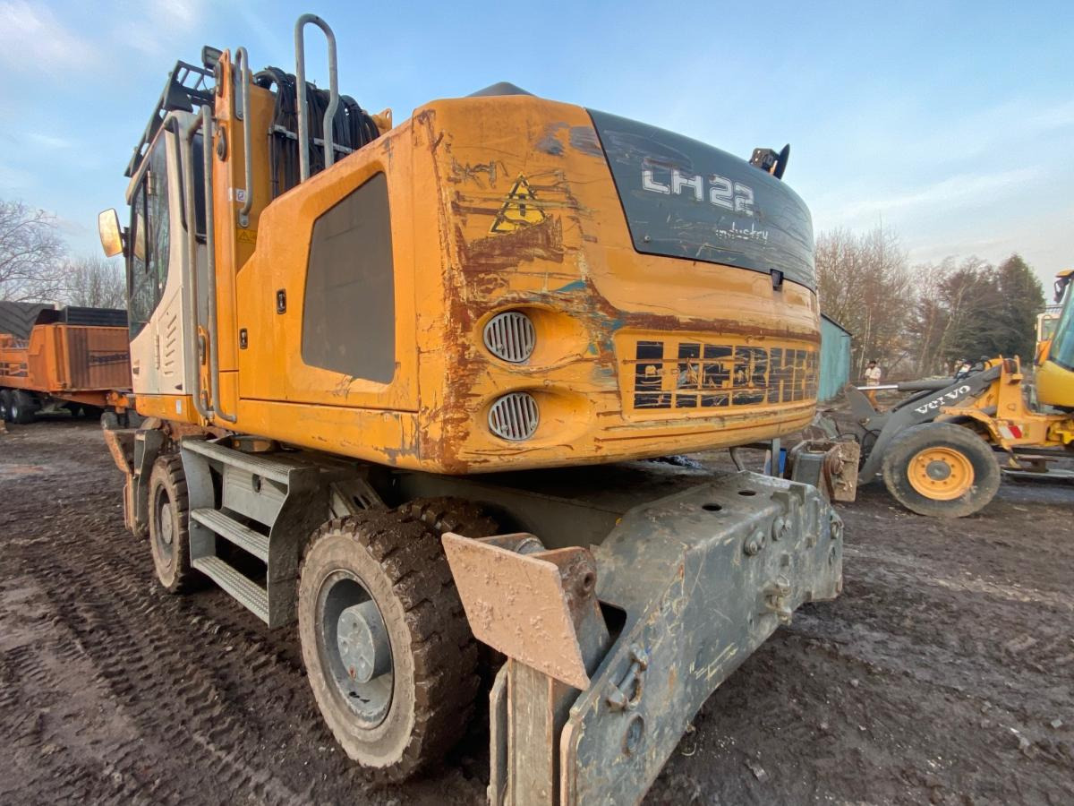 Liebherr LH 22 - Hulladék kotró: 5 kép. Liebherr LH 22 - Hulladék kotró: 5 kép.