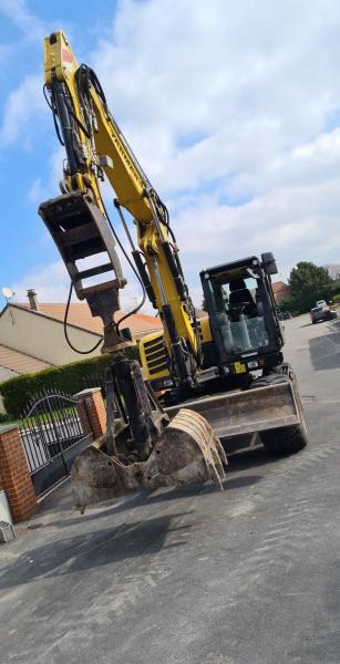 Yanmar B 110 W - Gumikerekes kotró: 4 kép. Yanmar B 110 W - Gumikerekes kotró: 4 kép.