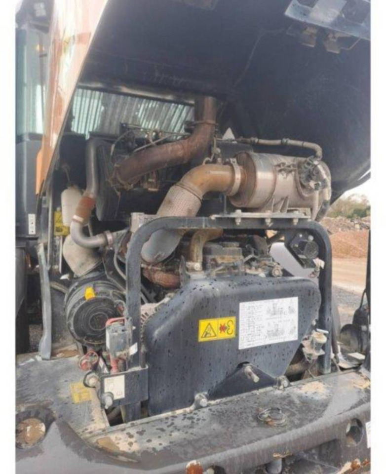 Gumikerekes homlokrakodó CASE 521 GXR: 14 kép.