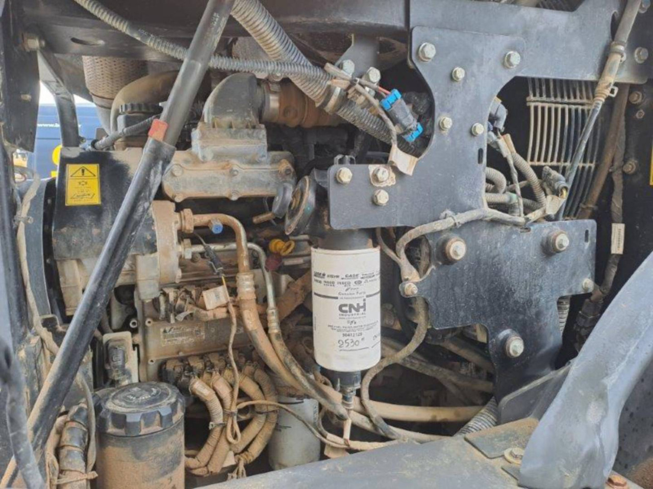 Gumikerekes homlokrakodó CASE 521 GXR: 12 kép.