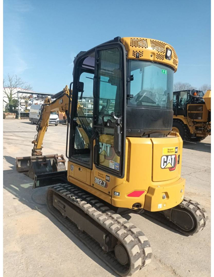 CAT 302.7 - Lánctalpas kotró: 2 kép. CAT 302.7 - Lánctalpas kotró: 2 kép.