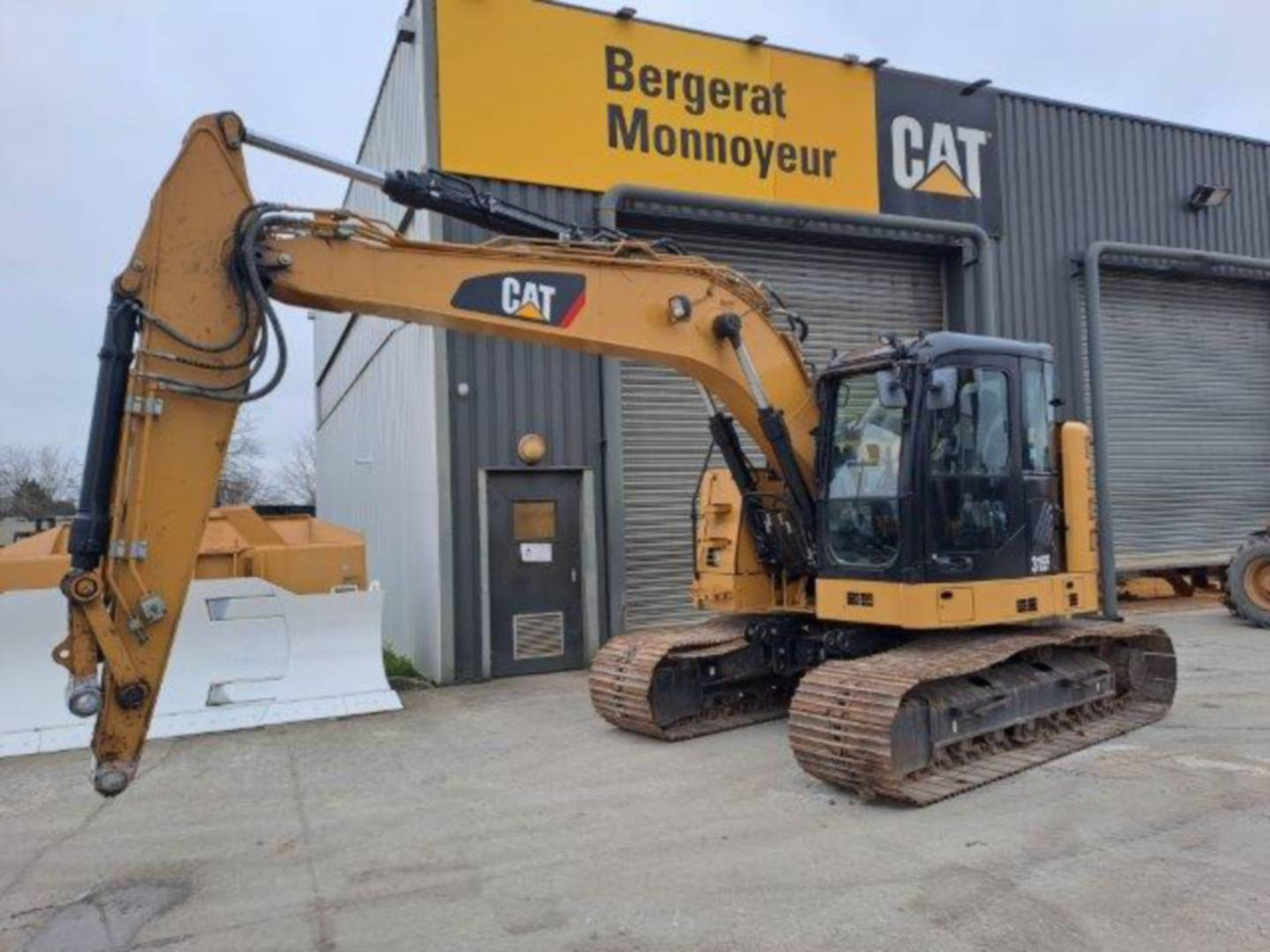 CAT 315F - Lánctalpas kotró: 1 kép. CAT 315F - Lánctalpas kotró: 1 kép.