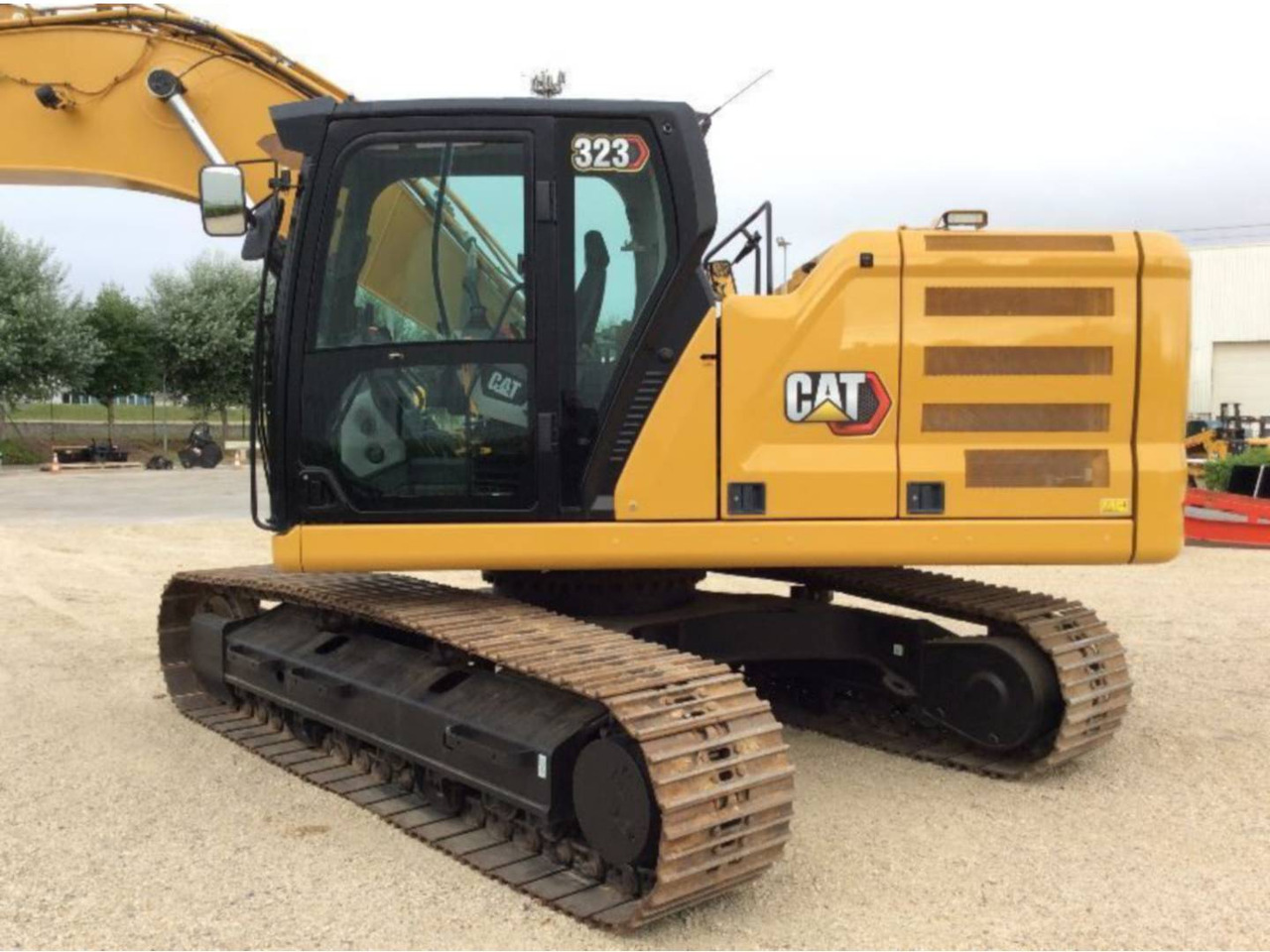 CAT 323 - Lánctalpas kotró: 1 kép. CAT 323 - Lánctalpas kotró: 1 kép.