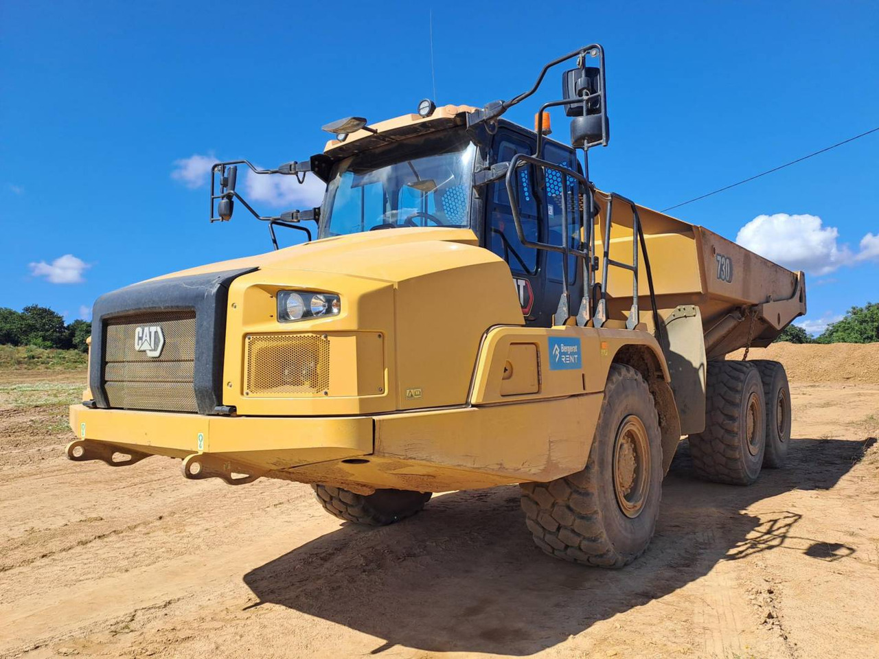 CAT 730 - Csuklós dömper: 2 kép. CAT 730 - Csuklós dömper: 2 kép.
