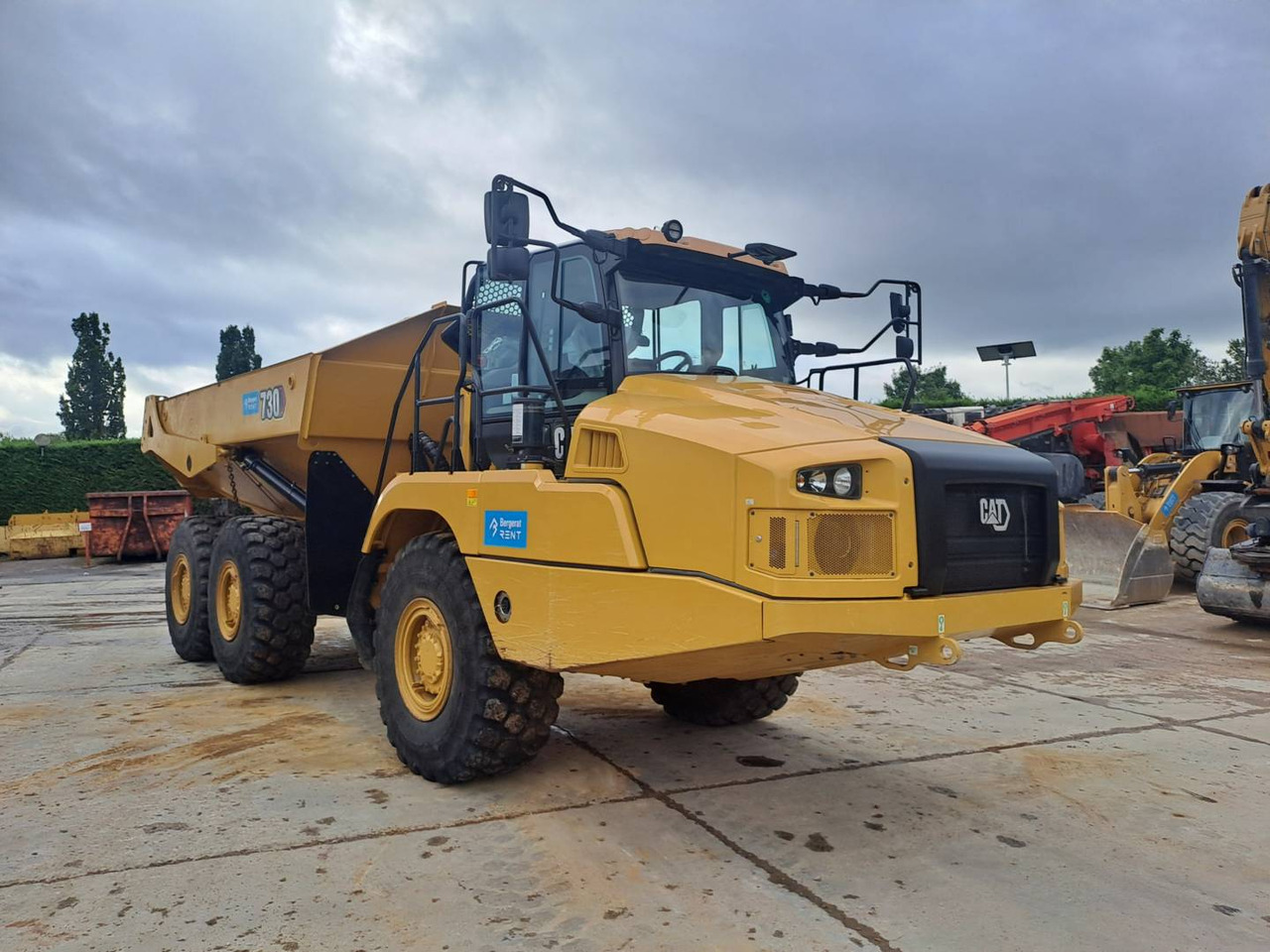 CAT 730 - Csuklós dömper: 2 kép. CAT 730 - Csuklós dömper: 2 kép.