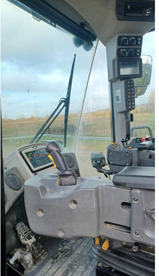 Gumikerekes homlokrakodó CAT 972M: 13 kép. Gumikerekes homlokrakodó CAT 972M: 13 kép.