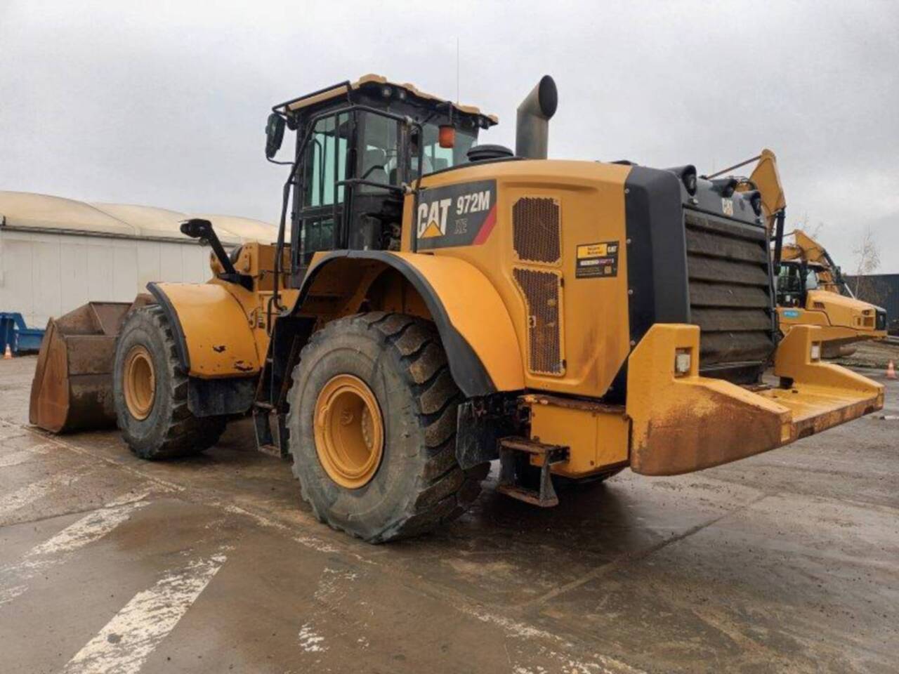 CAT 972M XE - Gumikerekes homlokrakodó: 4 kép. CAT 972M XE - Gumikerekes homlokrakodó: 4 kép.
