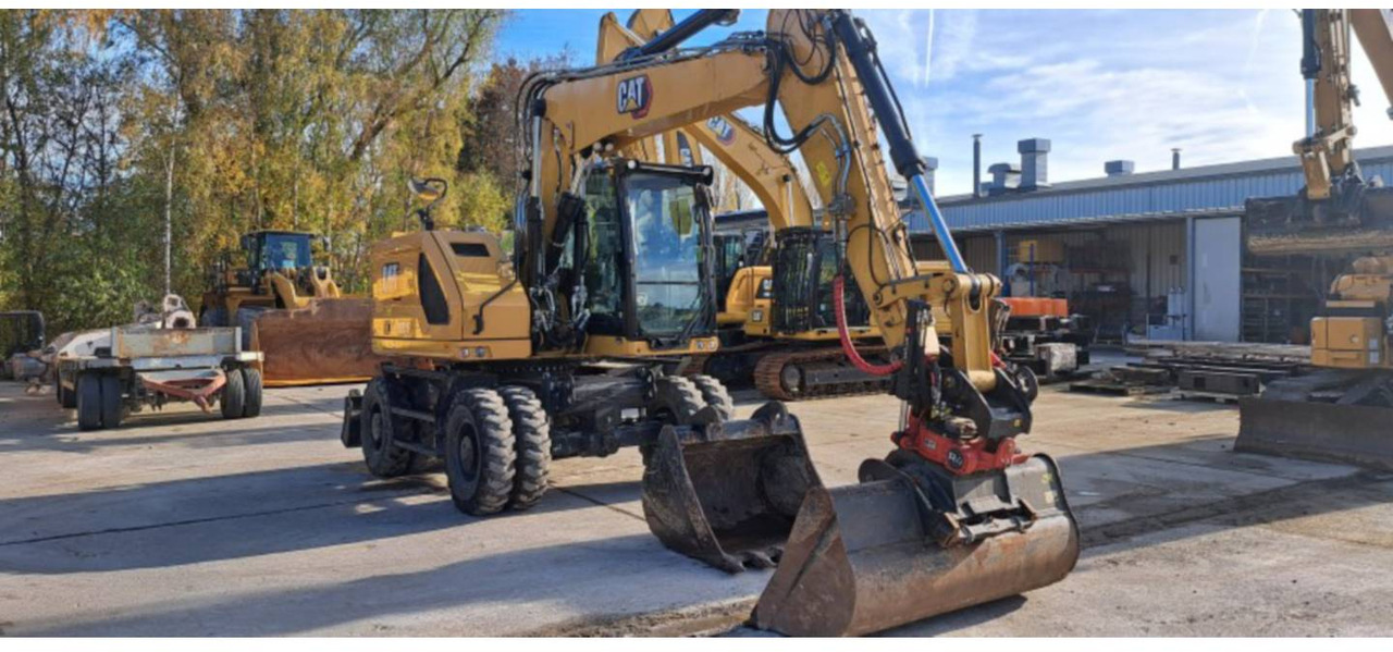 CAT M315-07 - Gumikerekes kotró: 2 kép. CAT M315-07 - Gumikerekes kotró: 2 kép.