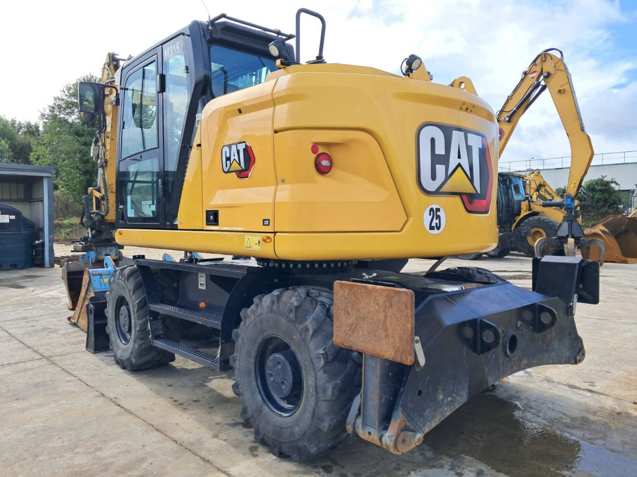 CAT M315 - Gumikerekes kotró: 3 kép. CAT M315 - Gumikerekes kotró: 3 kép.