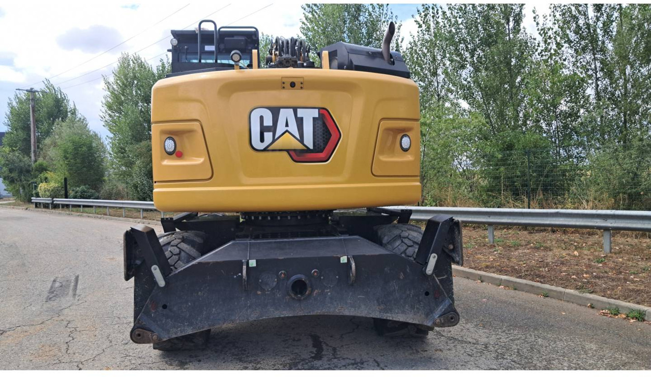 CAT M315F IVC - Gumikerekes kotró: 4 kép. CAT M315F IVC - Gumikerekes kotró: 4 kép.