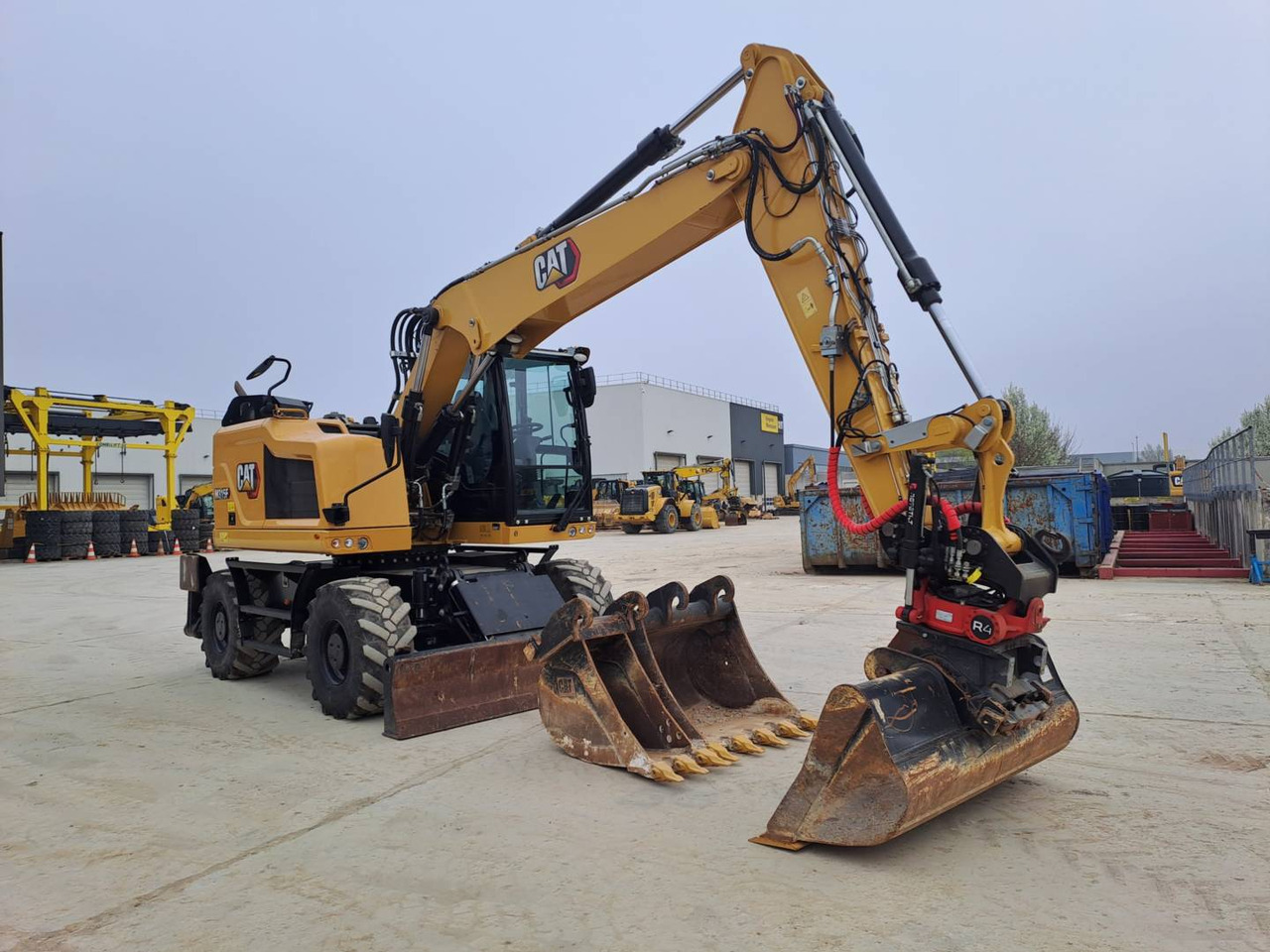 CAT M315F IVC - Gumikerekes kotró: 4 kép. CAT M315F IVC - Gumikerekes kotró: 4 kép.