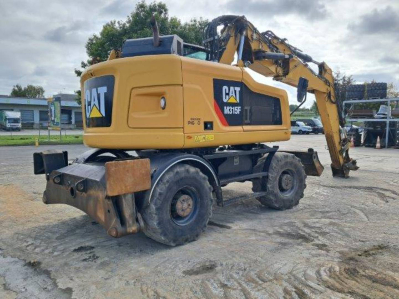 CAT M315F IVC - Gumikerekes kotró: 3 kép. CAT M315F IVC - Gumikerekes kotró: 3 kép.