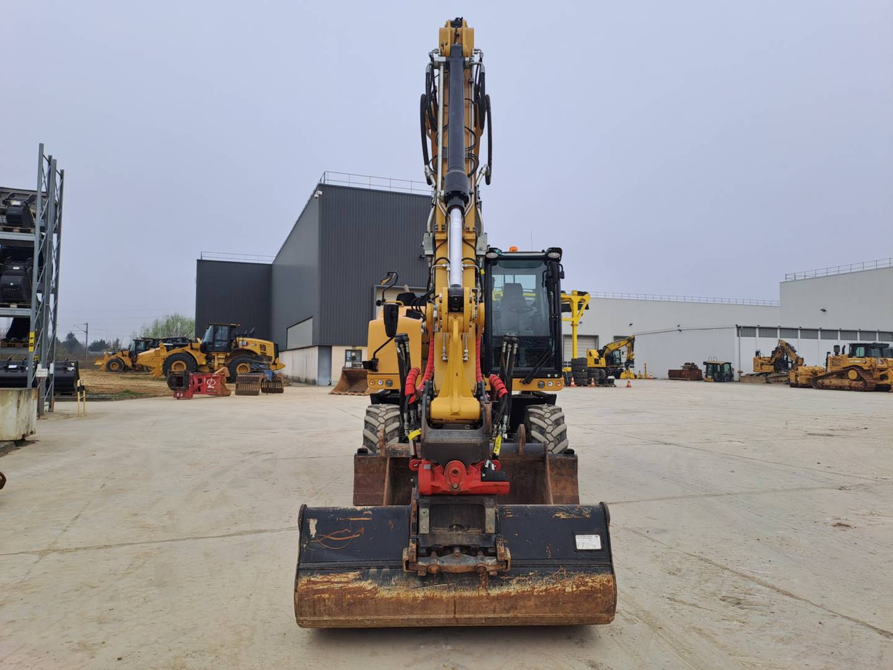 CAT M315F IVC - Gumikerekes kotró: 3 kép. CAT M315F IVC - Gumikerekes kotró: 3 kép.