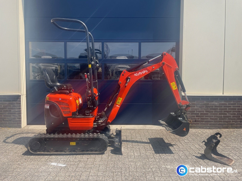 Kubota U10-3 Mini graafmachine - 900 kg - Verbreedbaar - Bouwjaar 2020 - Uren 1193 !! - 2 graafbakken - Zeer mooie machine - Minikotró: 1 kép. Kubota U10-3 Mini graafmachine - 900 kg - Verbreedbaar - Bouwjaar 2020 - Uren 1193 !! - 2 graafbakken - Zeer mooie machine - Minikotró: 1 kép.