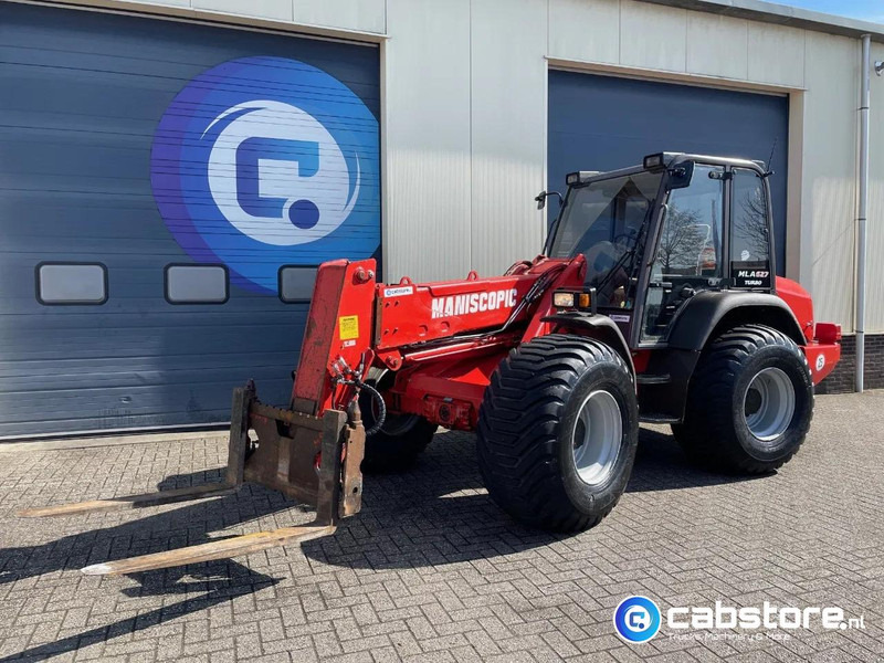 Manitou MLA 627 Turbo Powershift Telscopische wiellader - Verreiker - Telehandler radlader - Telescopic wheelloader - Year 1999 - Gumikerekes homlokrakodó: 4 kép. Manitou MLA 627 Turbo Powershift Telscopische wiellader - Verreiker - Telehandler radlader - Telescopic wheelloader - Year 1999 - Gumikerekes homlokrakodó: 4 kép.