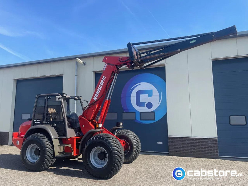 Manitou MLA 627 Turbo Powershift Telscopische wiellader - Verreiker - Telehandler radlader - Telescopic wheelloader - Year 1999 - Gumikerekes homlokrakodó: 2 kép. Manitou MLA 627 Turbo Powershift Telscopische wiellader - Verreiker - Telehandler radlader - Telescopic wheelloader - Year 1999 - Gumikerekes homlokrakodó: 2 kép.