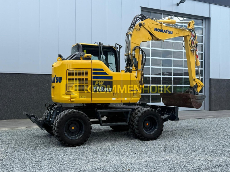 Komatsu PW 118 MR-11 - Gumikerekes kotró: 4 kép. Komatsu PW 118 MR-11 - Gumikerekes kotró: 4 kép.