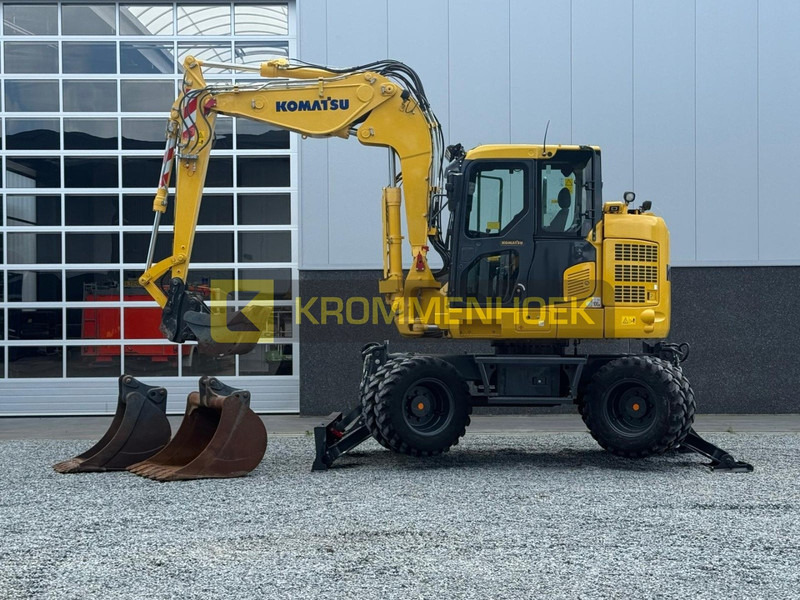 Komatsu PW 118 MR-11 - Gumikerekes kotró: 2 kép. Komatsu PW 118 MR-11 - Gumikerekes kotró: 2 kép.