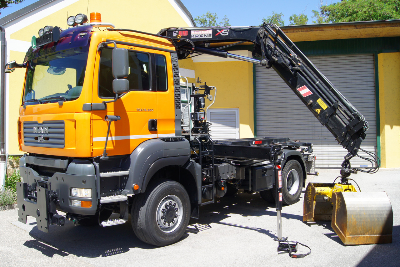 MAN TGA 18.360 BL 4x4/Euro 4/TÜV/HIAB 111/MULTILIFT/Winterdienst - Horgos rakodó teherautó, Darus autó: 2 kép. MAN TGA 18.360 BL 4x4/Euro 4/TÜV/HIAB 111/MULTILIFT/Winterdienst - Horgos rakodó teherautó, Darus autó: 2 kép.