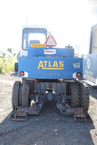 Atlas 1004 - Gumikerekes kotró: 5 kép. Atlas 1004 - Gumikerekes kotró: 5 kép.