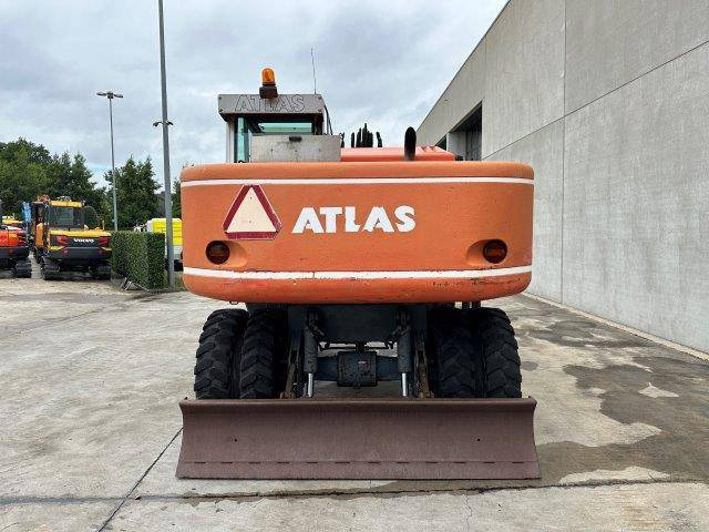 Atlas 1504M - Gumikerekes kotró: 5 kép. Atlas 1504M - Gumikerekes kotró: 5 kép.
