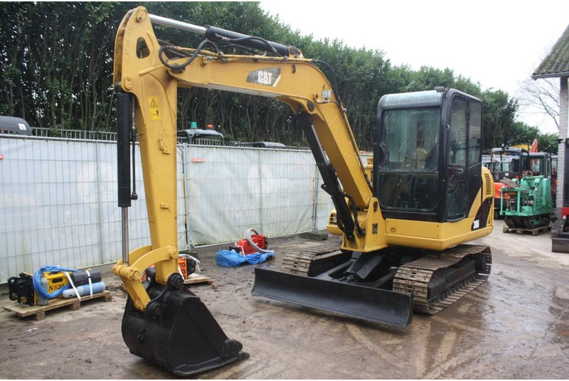 Caterpillar 306 - Lánctalpas kotró: 3 kép. Caterpillar 306 - Lánctalpas kotró: 3 kép.