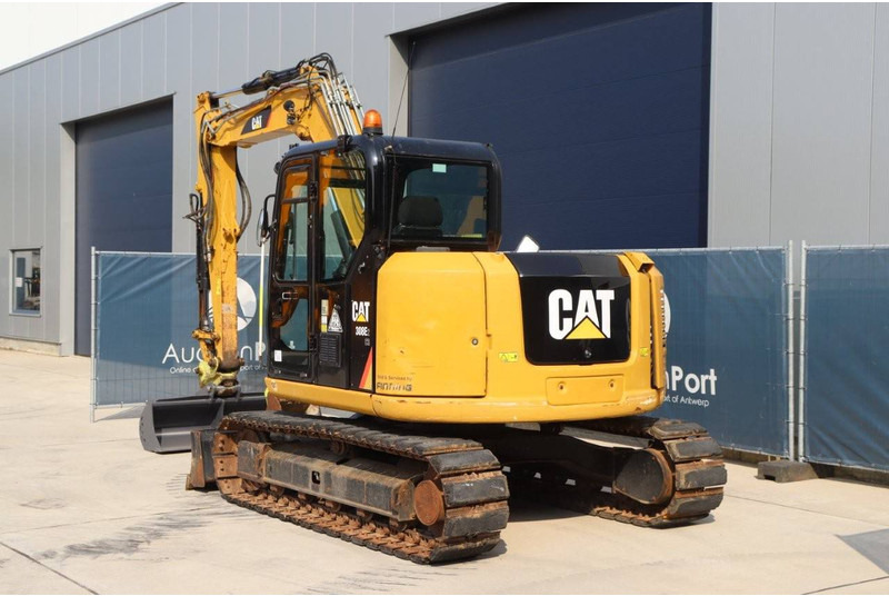 Caterpillar 308E2 CR - Lánctalpas kotró: 4 kép. Caterpillar 308E2 CR - Lánctalpas kotró: 4 kép.