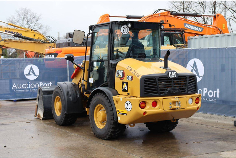 Caterpillar 906 - Gumikerekes homlokrakodó: 4 kép. Caterpillar 906 - Gumikerekes homlokrakodó: 4 kép.