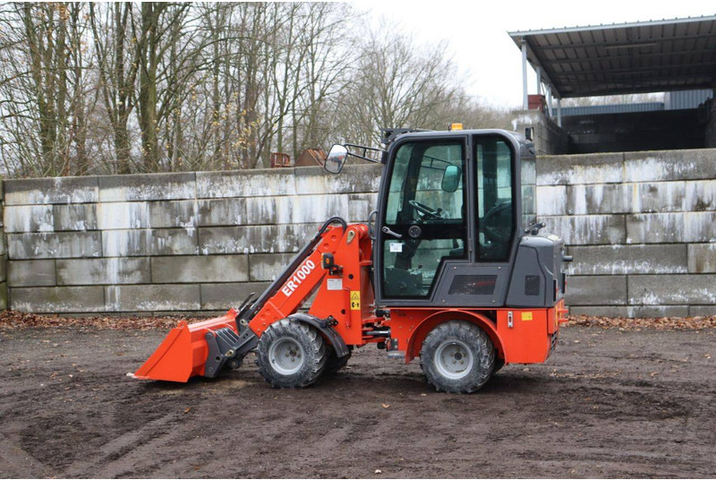 Everun ER1000 - Gumikerekes homlokrakodó: 3 kép. Everun ER1000 - Gumikerekes homlokrakodó: 3 kép.