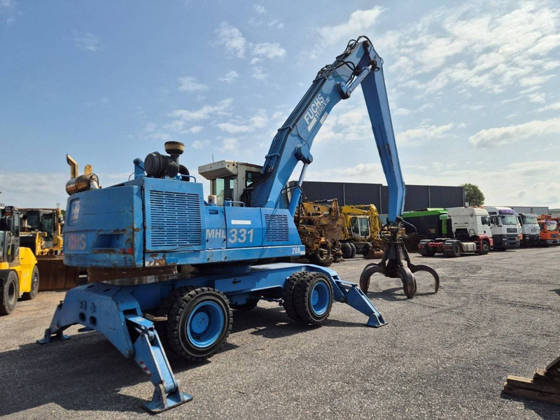 Fuchs MHL331 - Gumikerekes kotró: 3 kép. Fuchs MHL331 - Gumikerekes kotró: 3 kép.