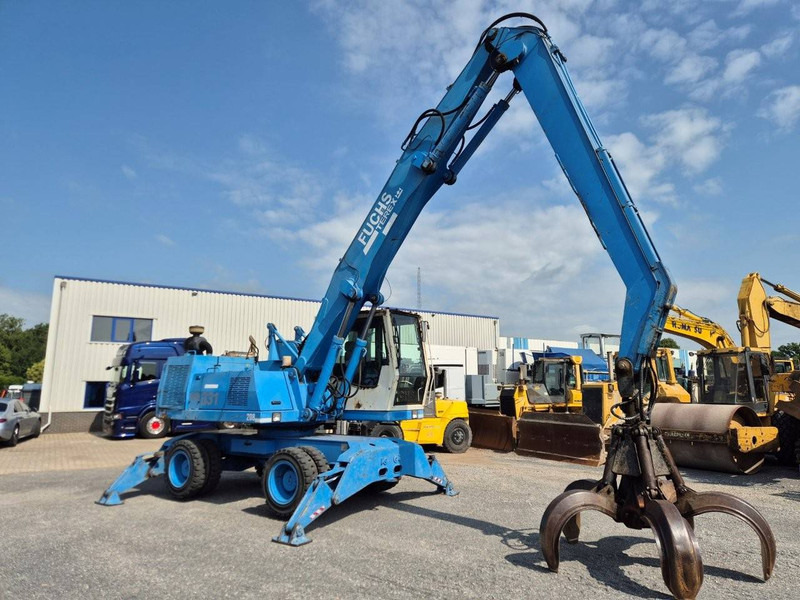 Fuchs MHL331 - Gumikerekes kotró: 4 kép. Fuchs MHL331 - Gumikerekes kotró: 4 kép.