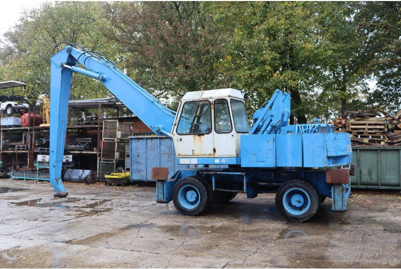 Fuchs Type F 714.4 - Gumikerekes kotró: 3 kép. Fuchs Type F 714.4 - Gumikerekes kotró: 3 kép.