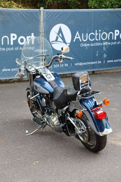 Harley-Davidson Fat Boy - Motorkerékpár: 4 kép. Harley-Davidson Fat Boy - Motorkerékpár: 4 kép.
