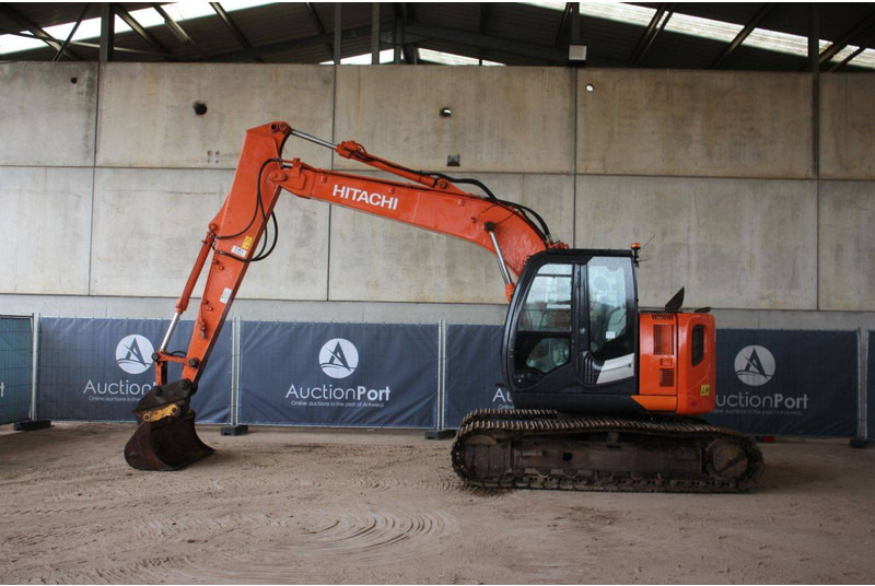 Hitachi ZX135US-5B - Lánctalpas kotró: 2 kép. Hitachi ZX135US-5B - Lánctalpas kotró: 2 kép.