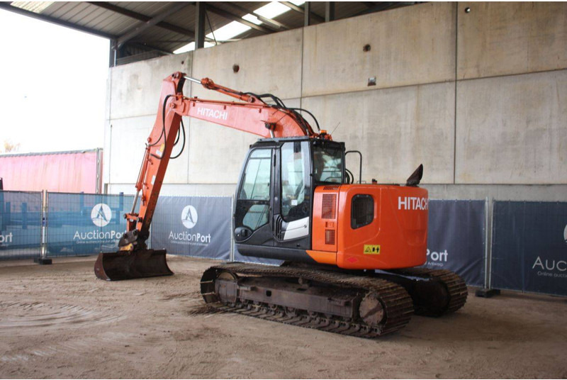 Hitachi ZX135US-5B - Lánctalpas kotró: 3 kép. Hitachi ZX135US-5B - Lánctalpas kotró: 3 kép.